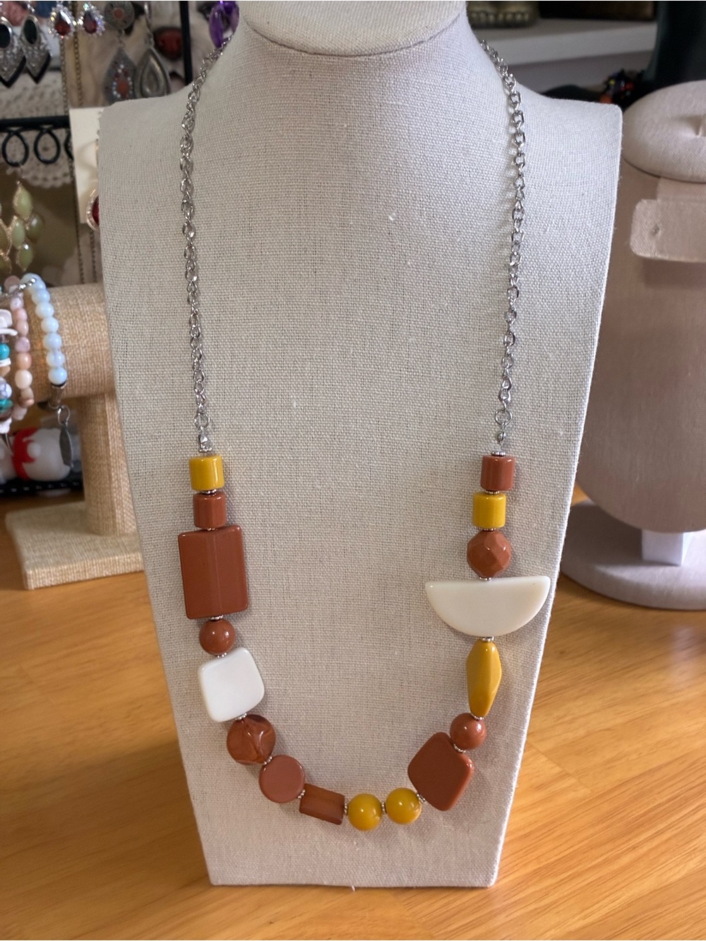 This piece is the Tranquil Trendsetter Necklace in Yellow by Paparazzi Acc.